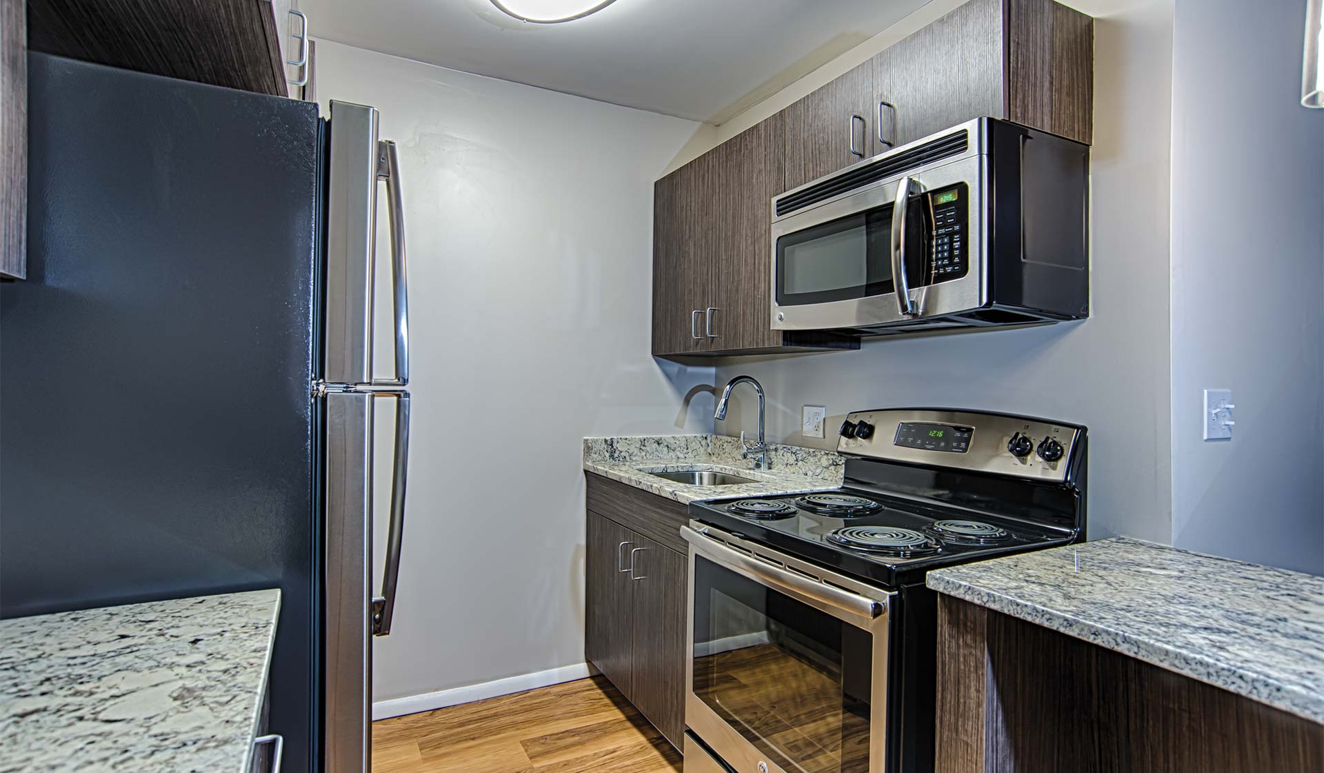 Renovated kitchens are available in select homes, featuring granite countertops and stainless steel appliances