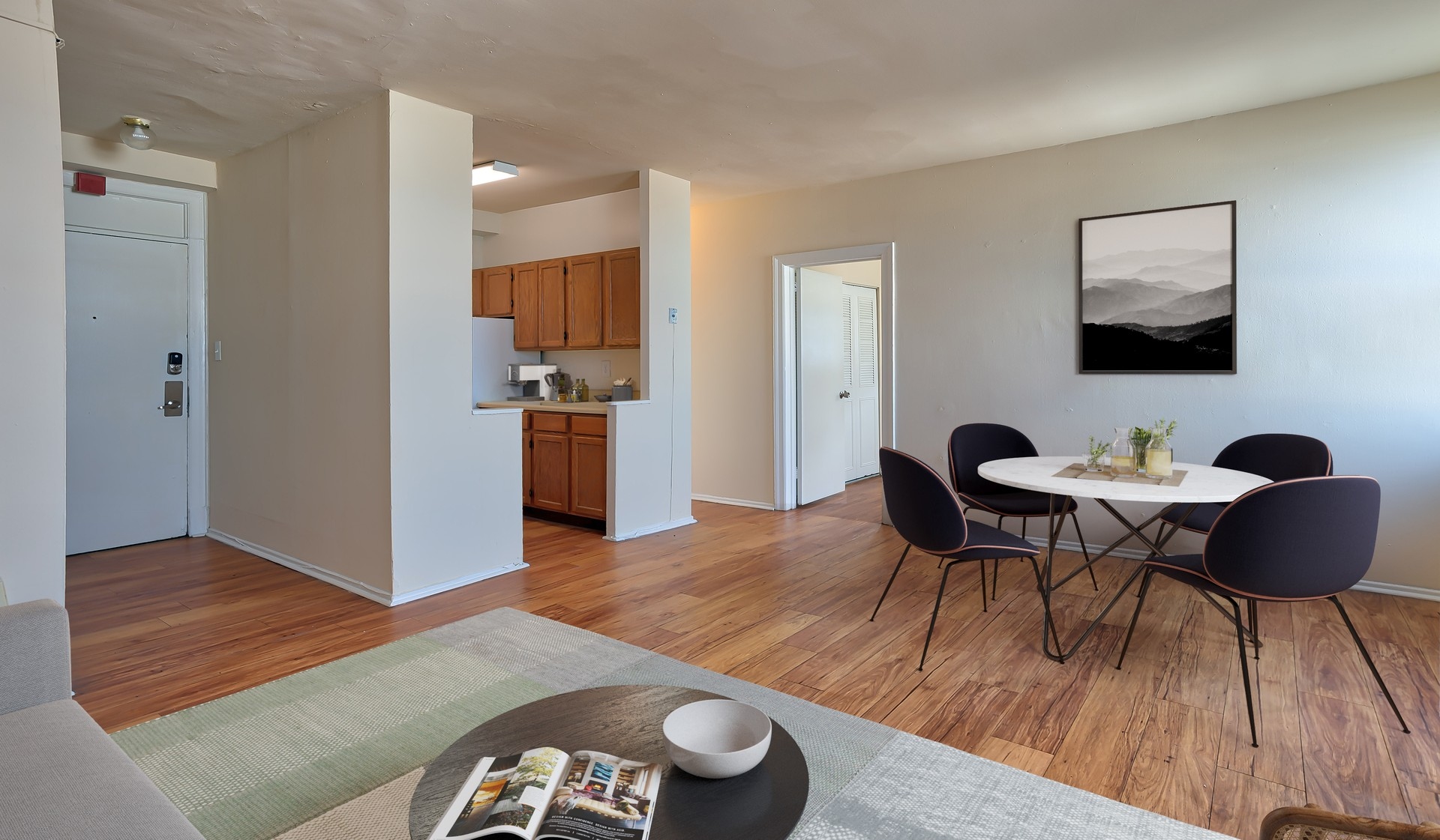 Spacious living room with wood flooring